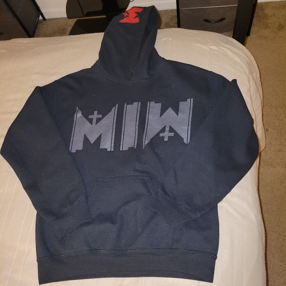 Motionless in white hoodie